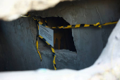 Authorities guard an illegal tunnel that crosses the border between Mexico and the United States