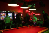 People visit a local pub and casino in Lagos