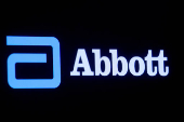FILE PHOTO: Abbott Laboratories logo is displayed on a screen at the  NYSE in New York