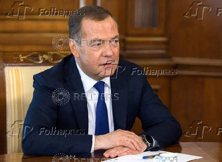 FILE PHOTO: Deputy head of Russia's Security Council Medvedev gives interview outside Moscow