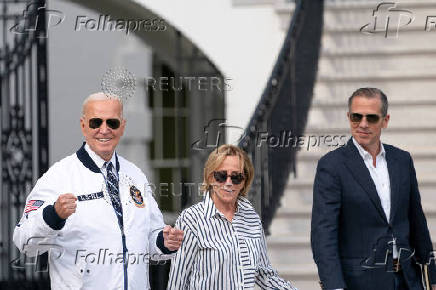 U.S. President Joe Biden wears the team USA Olympics jacket as he departs from the South Lawn of the White House