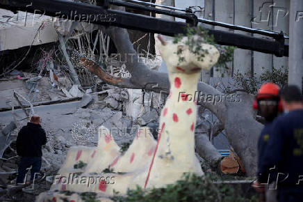 Scenes from a damaged site after a projectile fired from Yemen was intercepted, in Ramat Gan