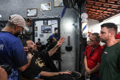 Boulos corta o cabelo em barbearia na Cidade Ademar