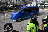 South Korea's impeached President Yoon Suk Yeol arrives for court