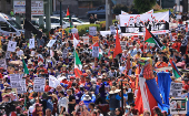 Workers rights and pro-Palestinian groups hold May Day rally in Los Angeles