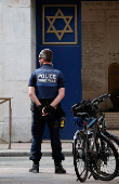 Police kill armed man who set fire to synagogue in Rouen