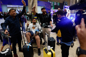 Maccabi Tel Aviv soccer fans arrive at the Ben Gurion International Airport