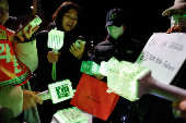 FILE PHOTO: Protesters take part in a rally calling for the impeachment of South Korean President Yoon Suk Yeol, in Seoul