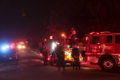 Firefighters battle the Sunset Wildfire in Los Angeles, California