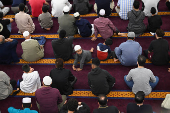 Muslims attend prayers at Lakemba Mosque in Sydney