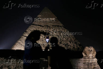 Giza Pyramids are lit up for World Tourism Day on the outskirts of Cairo