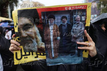 Iranians mourn the death of Lebanon's Hezbollah leader Nasrallah, in Tehran