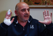 Lebanese hotelier Abbas al-Tannoukhi speaks during an interview with Reuters in Hazmieh