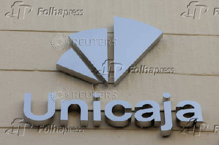 The new logo of Unicaja is seen on the facade of a Unicaja bank branch office, in Malaga