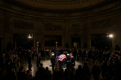 The casket of Jimmy Carter lies in state in Washington