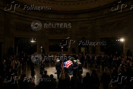 The casket of Jimmy Carter lies in state in Washington