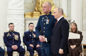 Russian President Vladimir Putin attends an awarding ceremony in Moscow