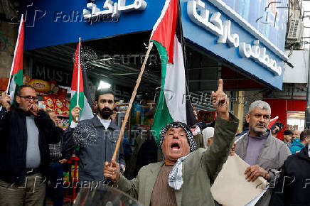 Palestinians demonstrate against Jenin camp shooting between security forces and militants, in Jenin