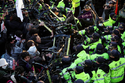 Protesters rally near impeached South Korean President Yoon's official residence, in Seoul