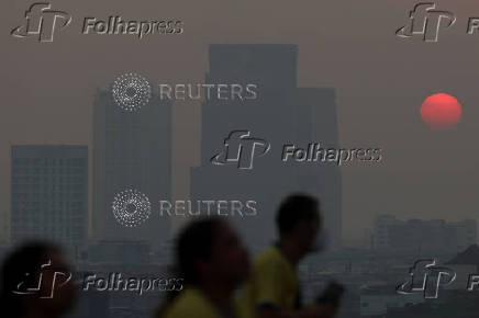 People attend a running event on the newly constructed cable-stayed Rama X Bridge or 