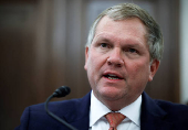 FILE PHOTO: Norfolk Southern Chief Executive Alan Shaw testifies before the Senate during a hearing about the East Palestine Derailment in Washington