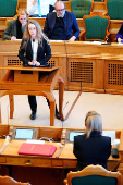 Greenlandic politician Aki-Matilda Hoeegh-Dam speaks in her native language, Greenlandic, as the Danish Parliament, for the first time, allows simultaneous interpretation during debates, in Copenhagen