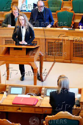 Greenlandic politician Aki-Matilda Hoeegh-Dam speaks in her native language, Greenlandic, as the Danish Parliament, for the first time, allows simultaneous interpretation during debates, in Copenhagen