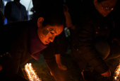 Demonstrators hold a vigil ahead of International Day for the Elimination of Violence Against Women, in Guatemala City