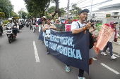 People rally on Human Rights Day in Jakarta