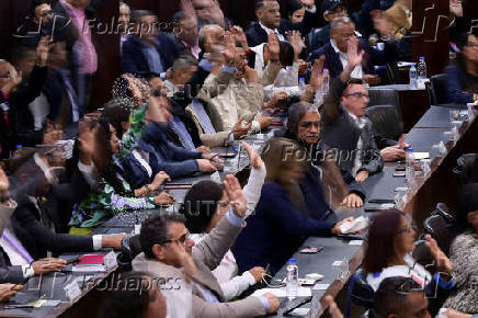 FILE PHOTO: Members of the National Assembly attend a session in Caracas