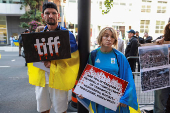 Protesters gather outside the Toronto International Film Festival (TIFF) screening of 'Russians at War', in Toronto