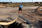 Flood-affected residents share opposite views on the Valencia marathon