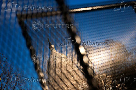 Security fencing encircles the U.S. Capitol building in Washington