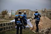 Syrian Civil Defense team clears unexploded ordnance in Idlib countryside