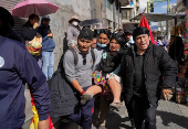 People protest against food shortages and rising prices in the food basket, in La Paz