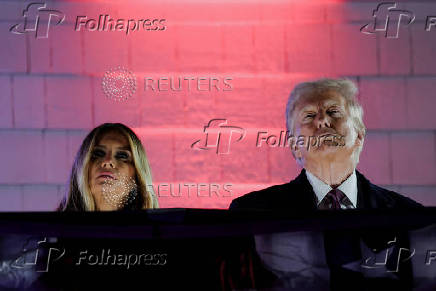 U.S. President-elect Donald Trump views fireworks at Trump National Golf Club Washington DC in Sterling