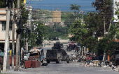 Haiti's capital almost completely cut off by blockades as gang violence intensifies, in Port-au-Prinxe