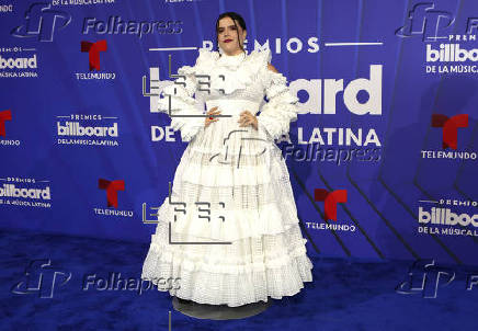 El negro y los diseos clsicos intervenidos dominaron la alfombra de los Latin Billboards