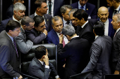 Congressmen attend a session of the National Congress at the plenary chamber of deputies in Brasilia