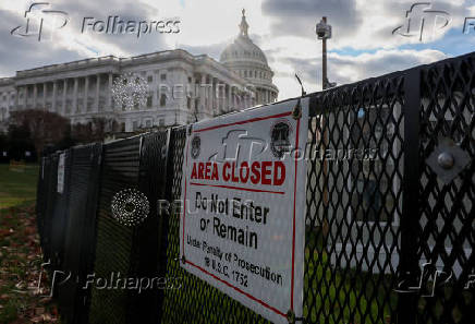 Security fencing encircles the US Capitol building in Washington