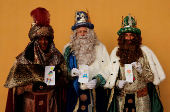 The Three Wise Men visit children and elderly people, ahead of the Epiphany parade, in Ronda