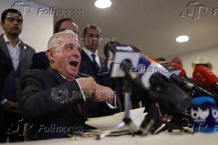 Colombia's former president Alvaro Uribe speaks during a news conference in Bogota