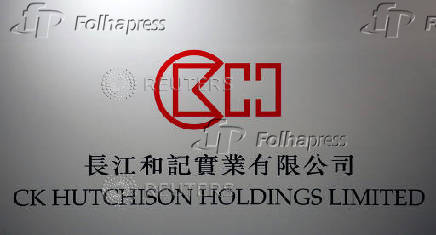 FILE PHOTO: The company logo of CK Hutchison Holdings is displayed at a news conference in Hong Kong