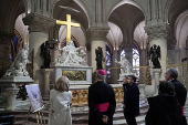 French President Macron visits the Notre-Dame Cathedral, in Paris