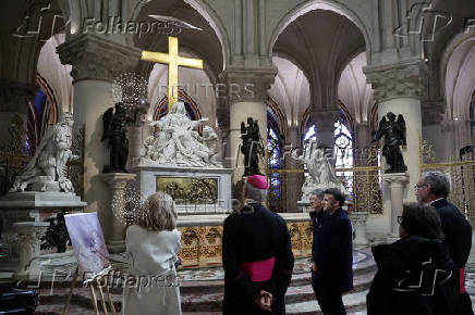 French President Macron visits the Notre-Dame Cathedral, in Paris