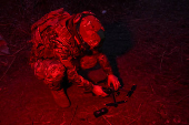 Policeman of the 'Khyzhak' Brigade prepares a drone for a flight at a position in a front line near the town of Toretsk