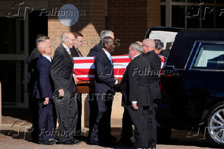 Former U.S. President Carter's casket travels to Atlanta, Georgia