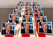 Ursula Trump presents pastries decorated with an eatable portrait of U.S. President-elect Donald Trump in a bakery in Freinsheim