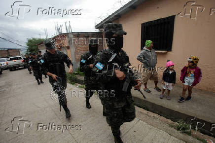 Honduran security forces hold operation against armed gangs, in Tegucigalpa