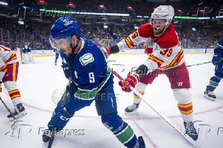 NHL: Calgary Flames at Vancouver Canucks